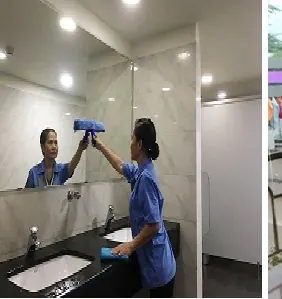 Tạp vụ lau gương nhà vệ sinh